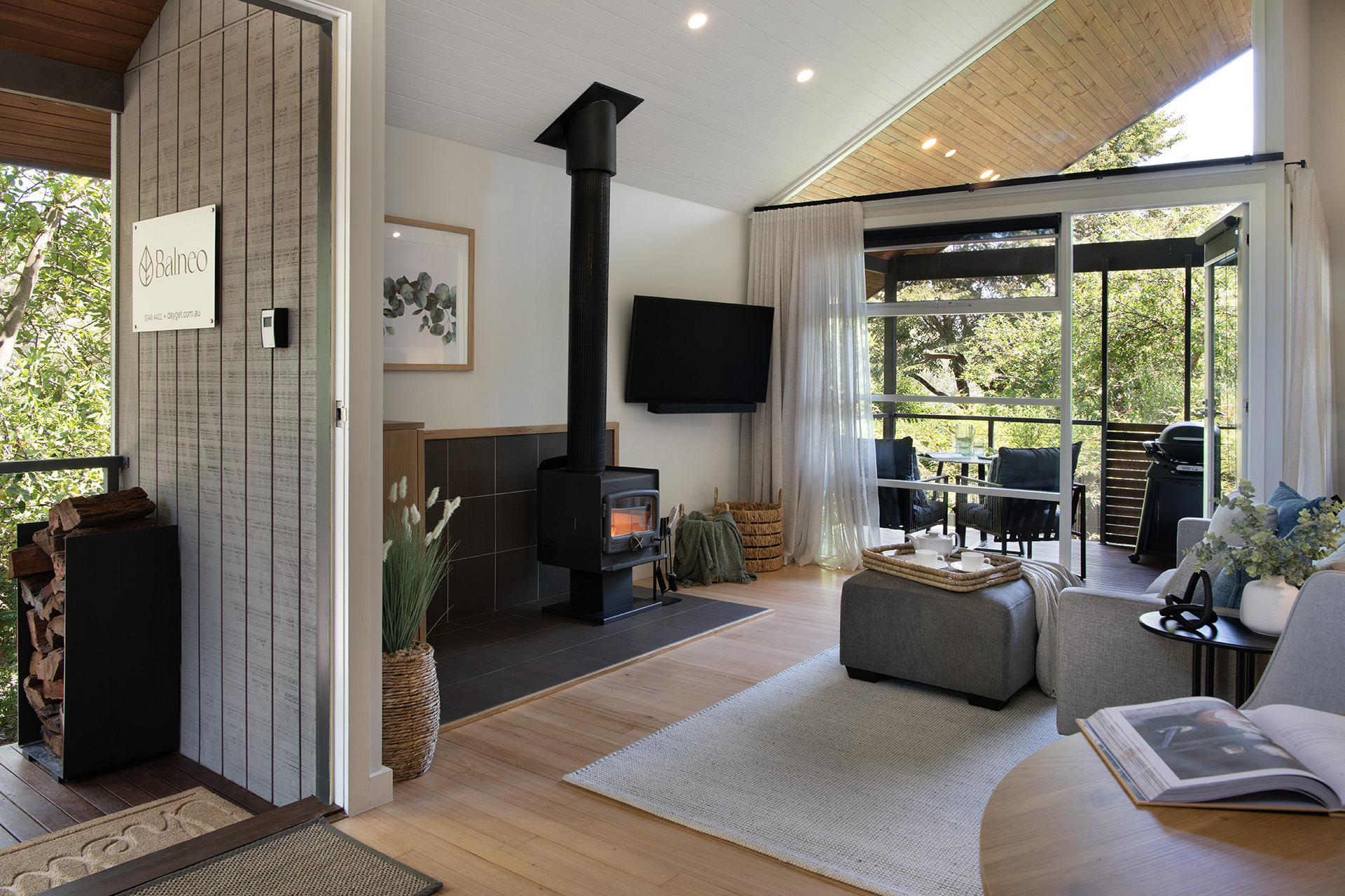 Balneo living area with wood fireplace